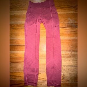 red heathered lululemon leggings